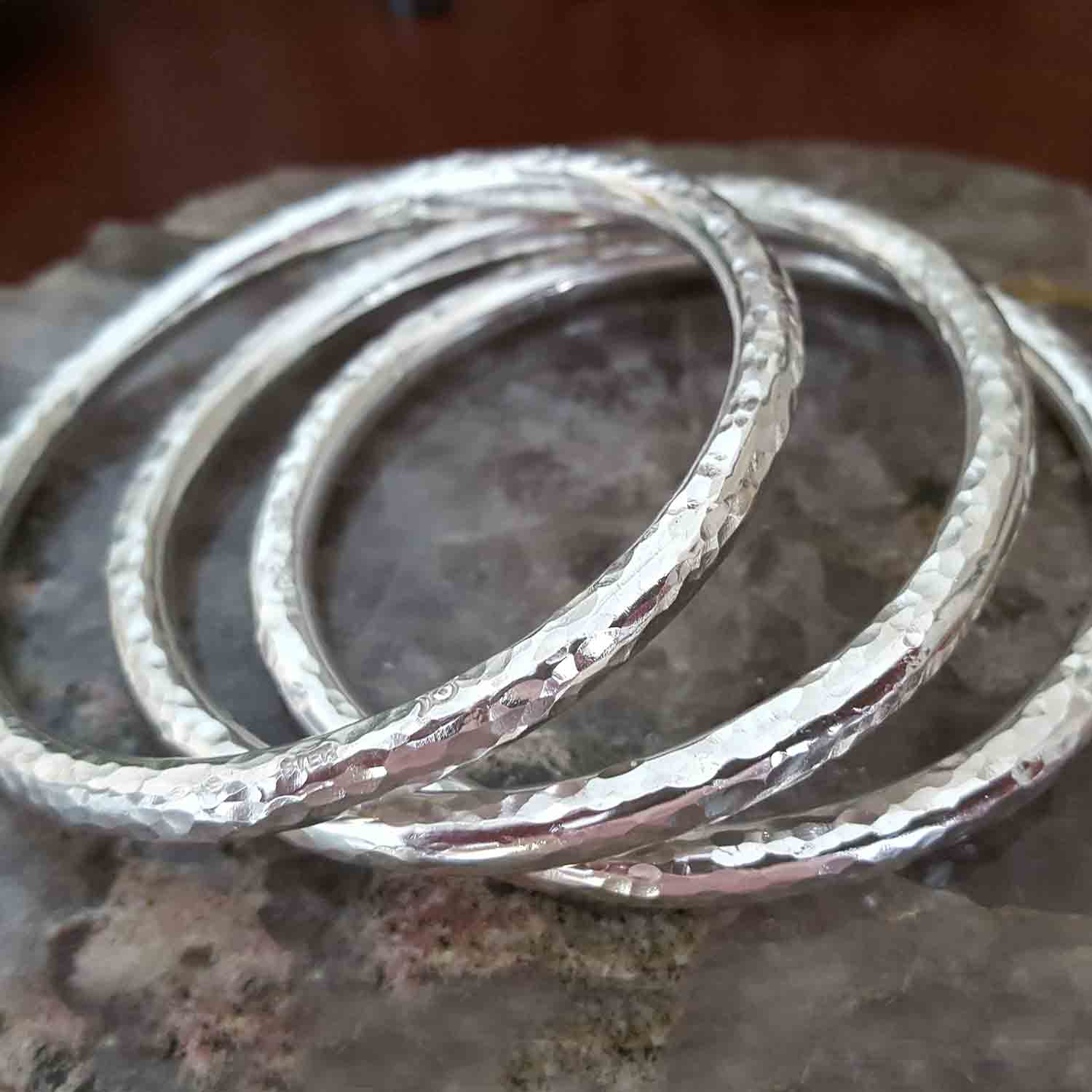 hand forged sterling silver bangles ~ heather reilly, metalsmith