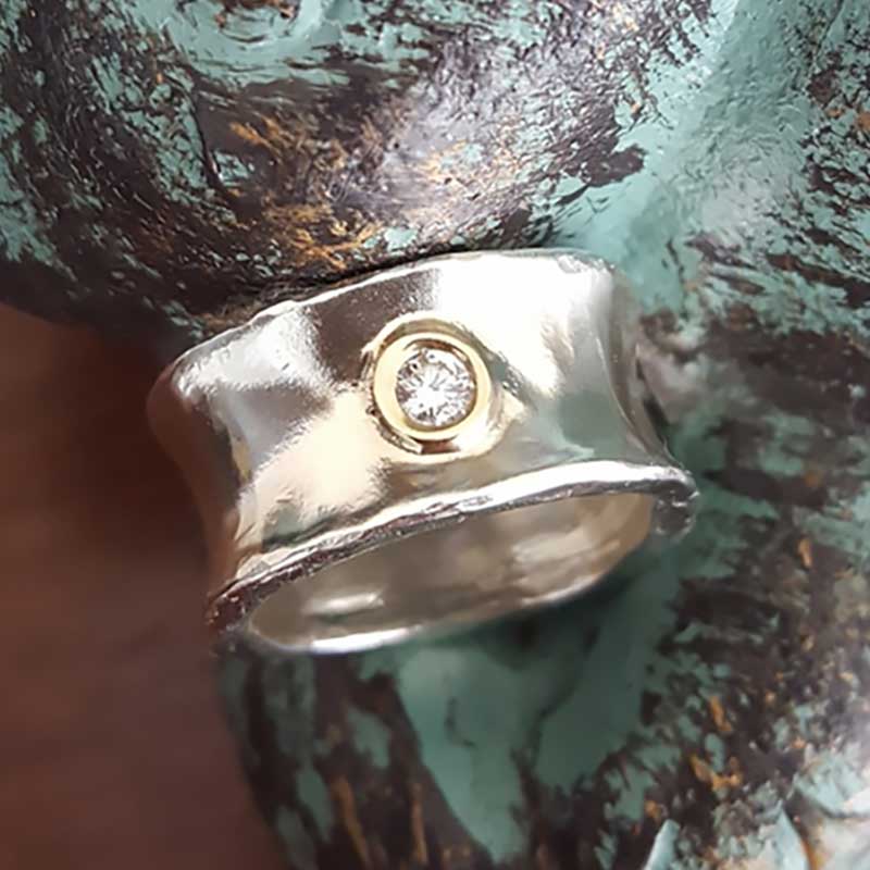 hand forged silver ring with diamond
