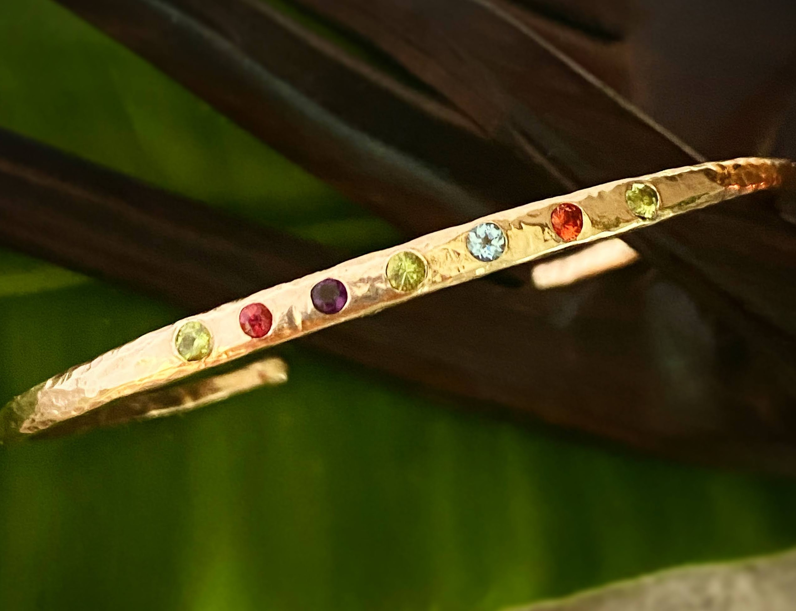 forged gold mother’s bracelet with birthstones